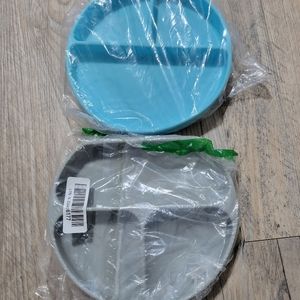 2 Baby Bibs and 1 silicon baby plate.